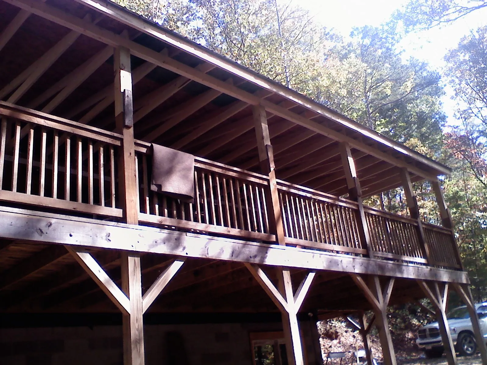 Timber framing under a new elevated porch and deck — Roof Leak Repair in East Springfield by Roofing Brothers